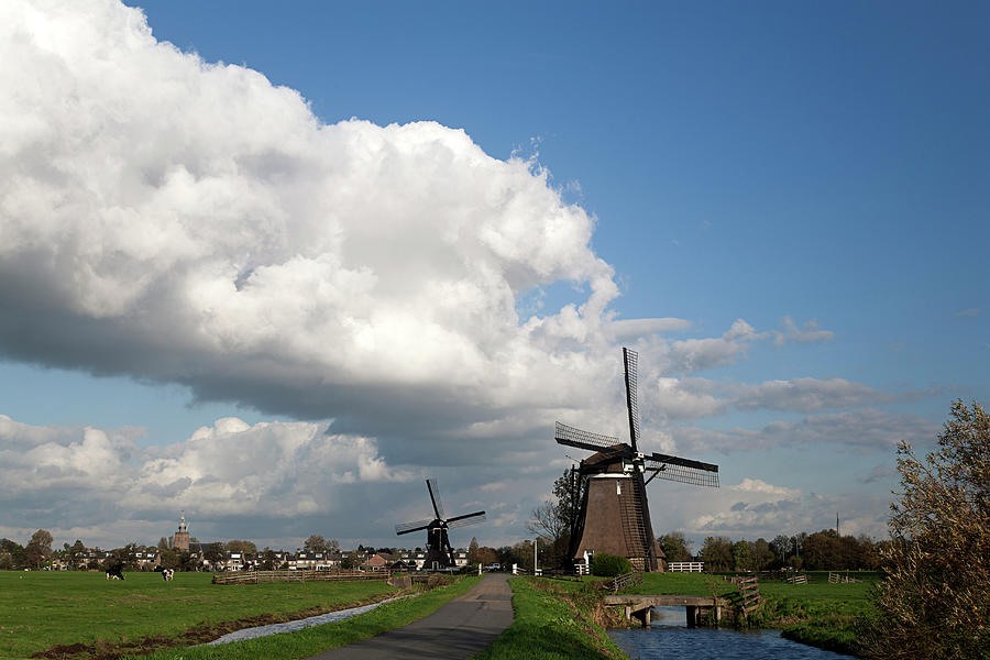 Two Windmills In Dutch Polder Photograph by Roel Meijer