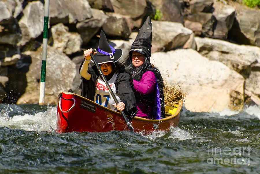 Two witches in a whitewater canoe Photograph by Les Palenik