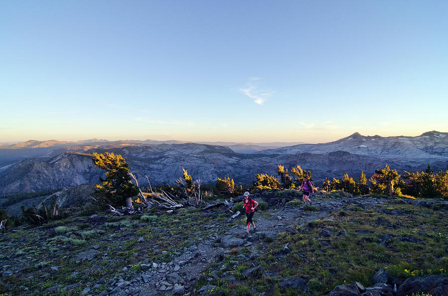 Two Women Hike Near The Summit Of Mount Photograph by Rachid Dahnoun