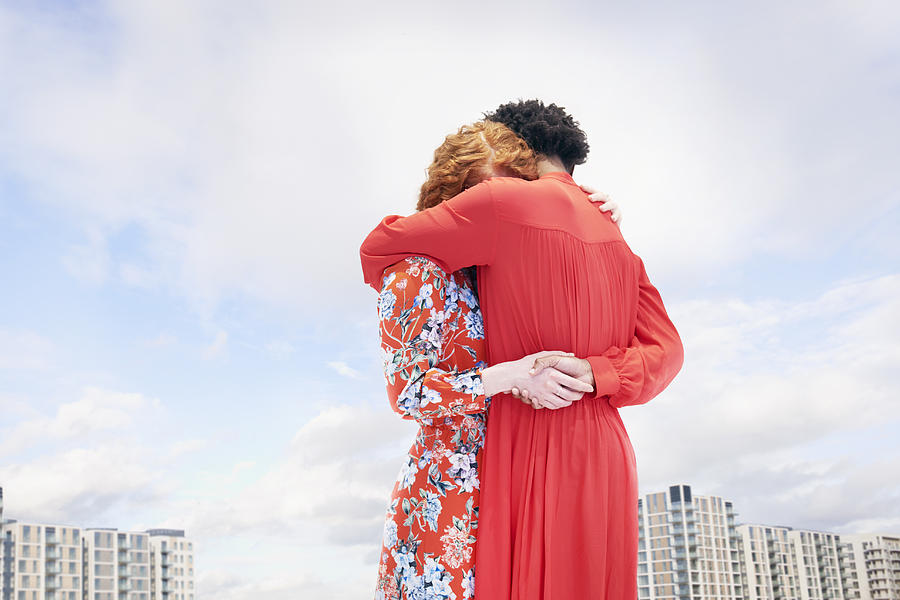 Two Women Hugging Photograph by Tara Moore