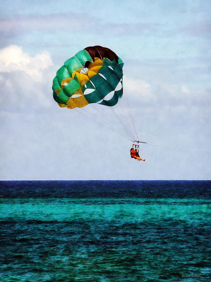 Two Women Parasailing In The Bahamas Photograph by Susan Savad