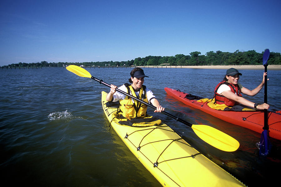 Two Women Sea Kayaking, Chesapeake Bay Photograph by Peter Dennen ...