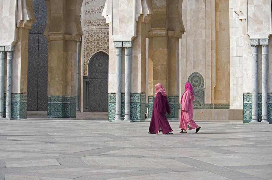 Two women walk in Hasan II Mosque in Casablanca, Morocco Photograph by Manx_in_the_world