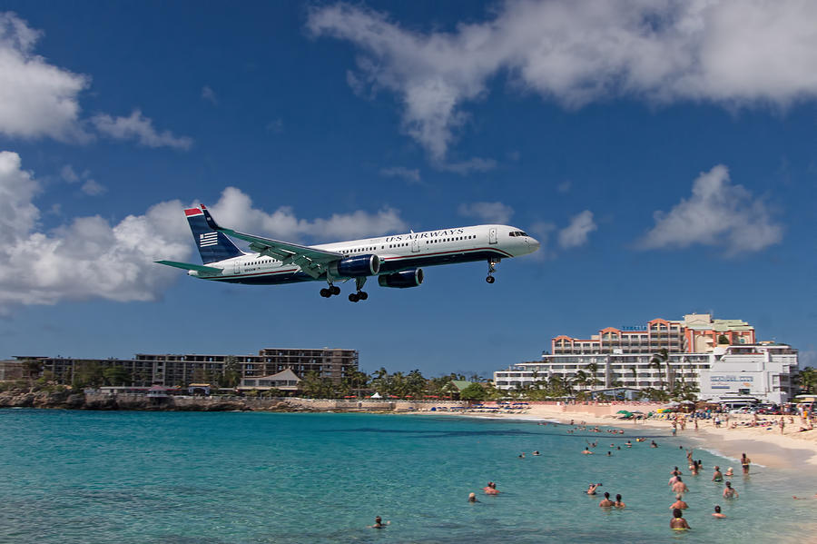 U S Airways low approach to St. Maarten Photograph by David Gleeson