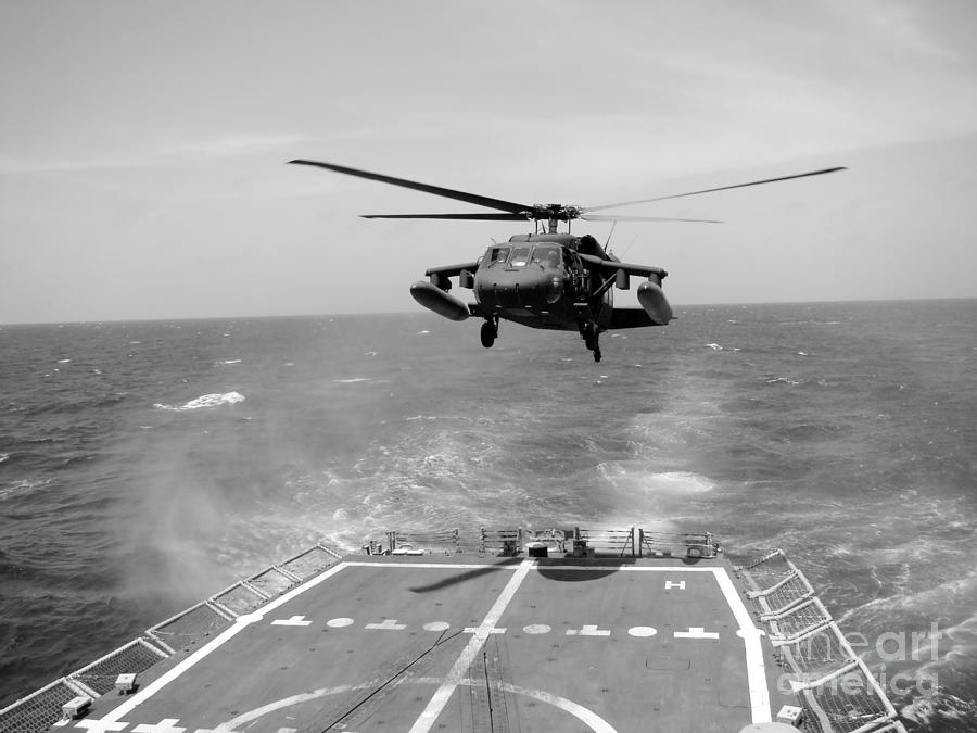 Uh-60 Black Hawk Helicopter Landing Aboard Uss Underwood Photograph