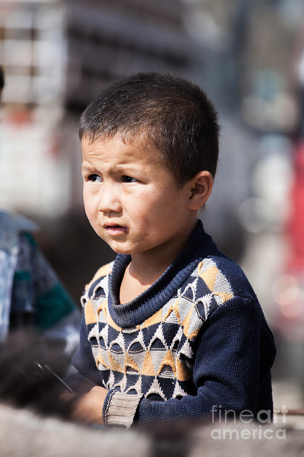 Uighur child at Kashgar market Xinjiang China Photograph by Matteo Colombo