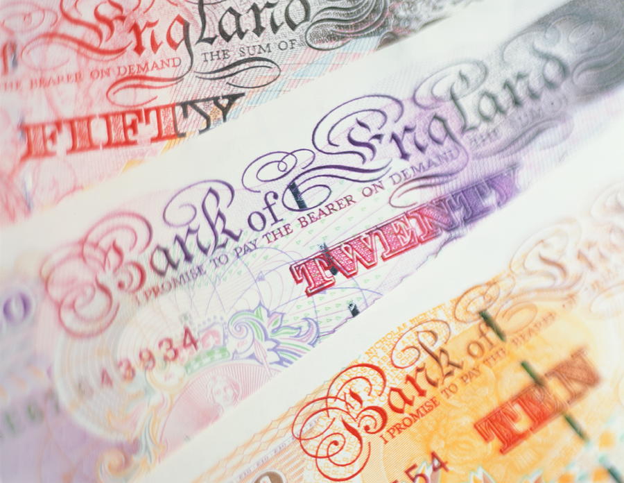 UK currency: English ten, twenty and fifty pound notes, close-up Photograph by Peter Dazeley