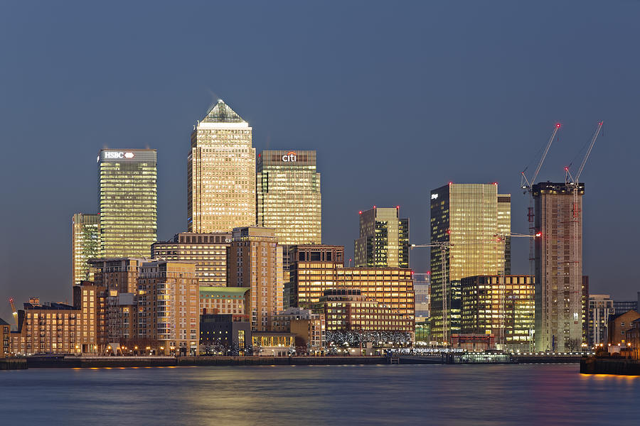 UK, London, skyline of Canary Wharf at River Thames at dusk Photograph by Westend61