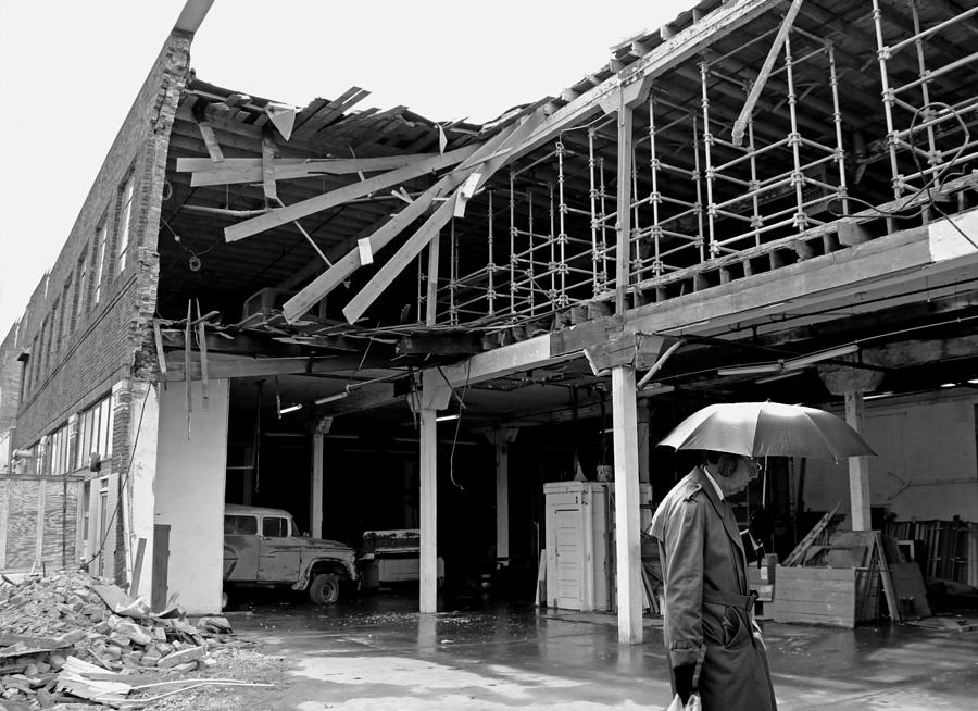 Umbrella Man at Warehouse Collapse Photograph by Christopher McKenzie