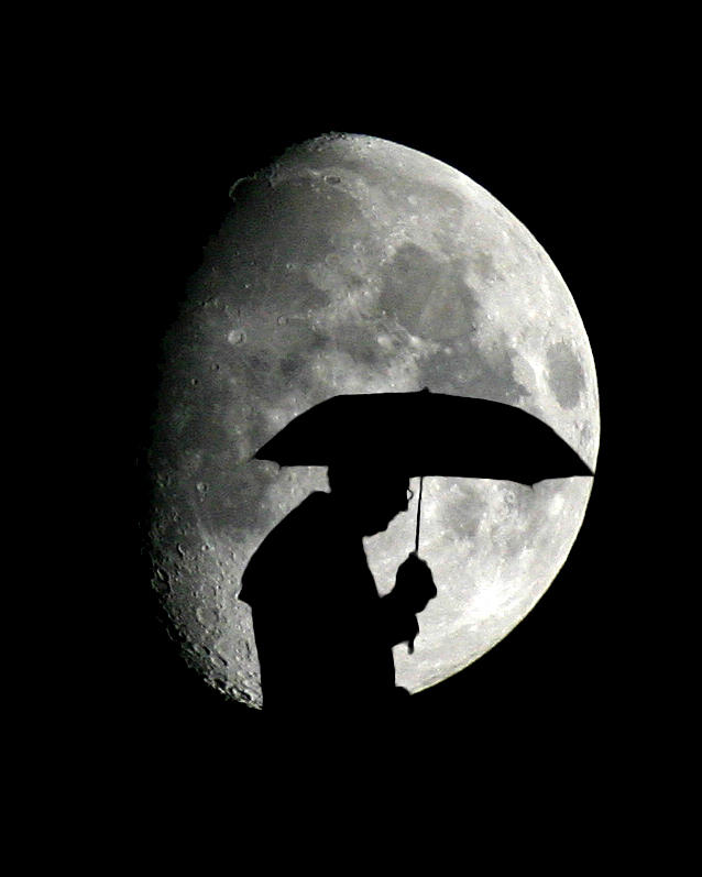 Umbrella Man with Moon Photograph by Christopher McKenzie