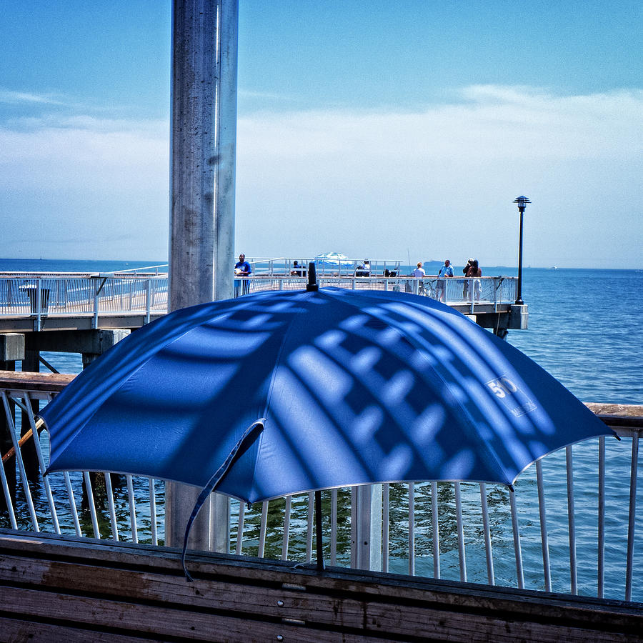 Umbrella on Coney Island Pier Photograph by Frank Winters