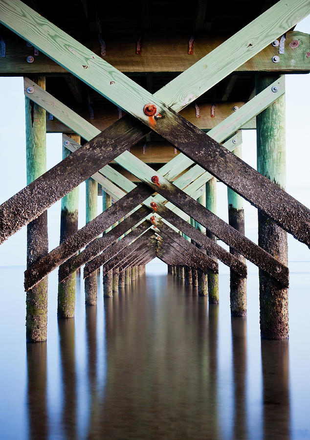 Underneath Pier Photograph by Enzo Figueres