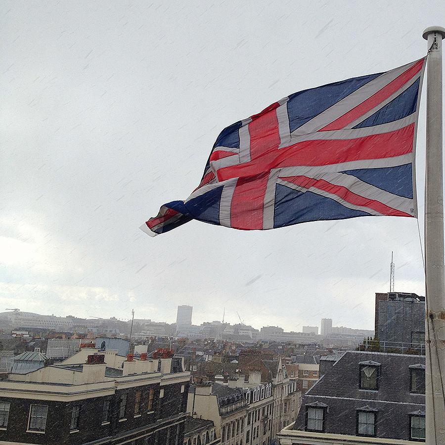 Union Jack In The Snow Photograph by Louise Morgan