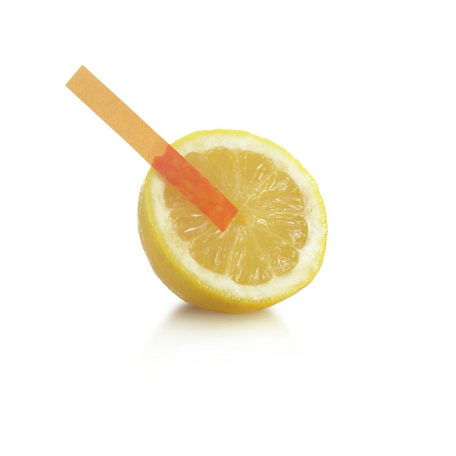 Universal Indicator Test On A Lemon Photograph by Science Photo Library