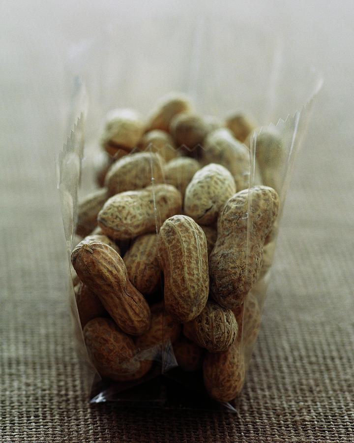 Unshelled Peanuts Photograph by Romulo Yanes