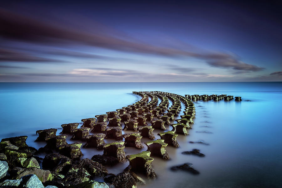 Unusual Sea Defenses At Felixstowe Photograph by Stevendocwra