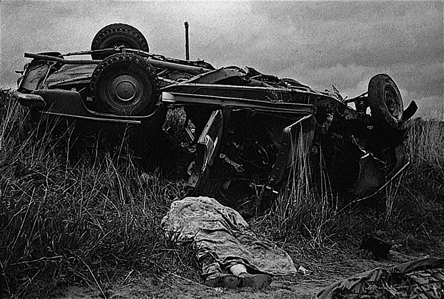 Upended car accident dead body Aberdeen South Dakota 1964 black and white Photograph by David Lee Guss