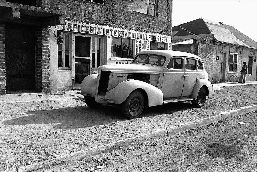 Upholstery shop 1930s car Naco Sonora Mexico 1980 Photograph by David Lee Guss