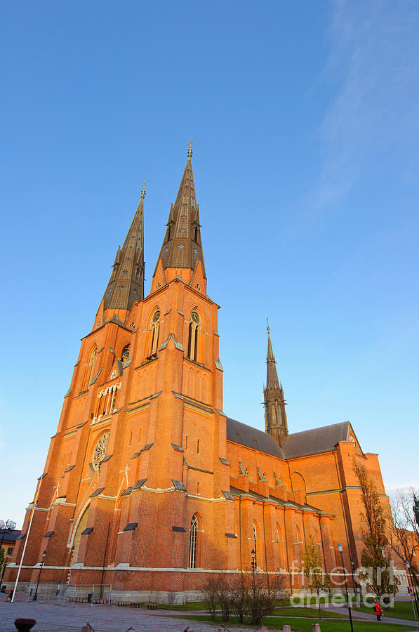 Architecture Photograph - Uppsala Cathedral in Sweden - glowing in the evening light by David Hill