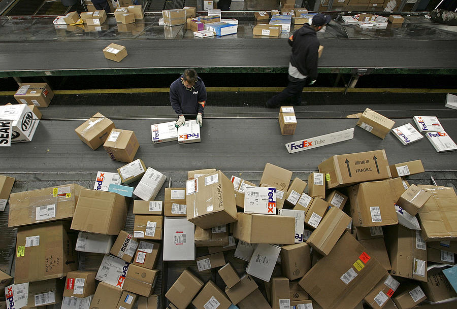 UPS And FedEx Deliver Packages As Holiday Shopping Season Begins Photograph by Justin Sullivan UPS And FedEx Deliver Packages As Holiday Shopping Season Begins Photograph by Justin Sullivan