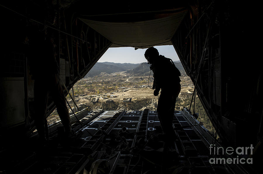 Transportation Photograph - U.s. Air Force Airman Pushes by Stocktrek Images