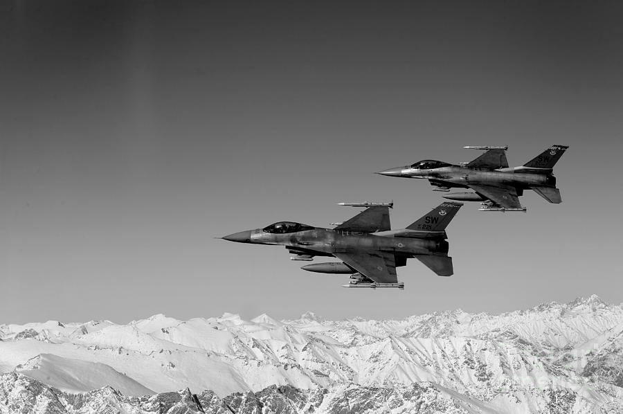 Transportation Photograph - U.S. Air Force F-16 Fighting Falcons over Afghanistan. by Stocktrek Images