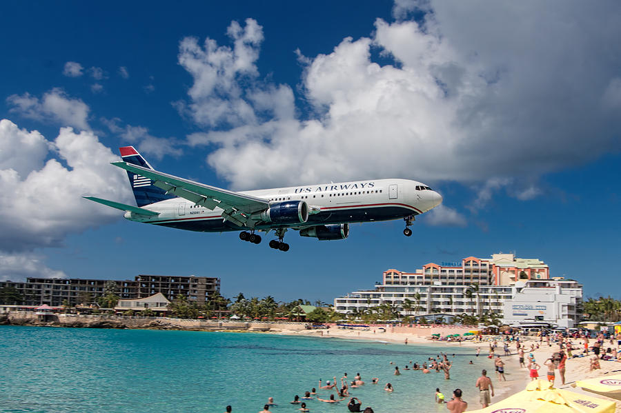 Sunset Photograph - U S Airways landing at St. Maarten by David Gleeson