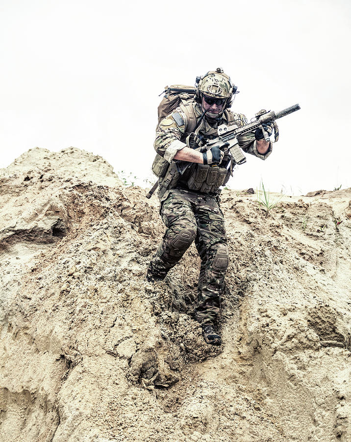 U.s. Army Commando Moving Down A Steep Photograph by Oleg Zabielin