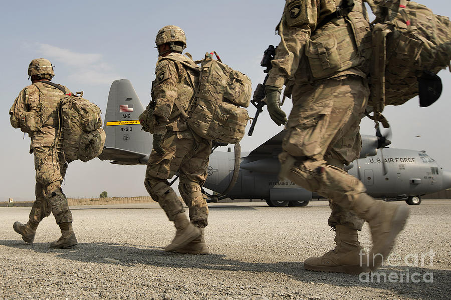 U.s. Army Soldiers Make Their Way Photograph by Stocktrek Images - Fine ...