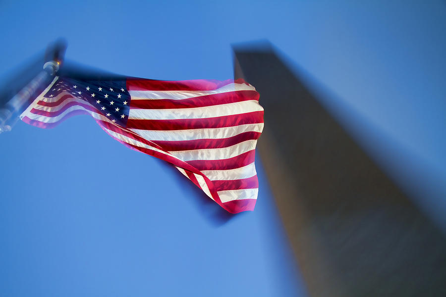 Us Flag Photograph - US Flag at Washington Monument at Dusk by David Smith