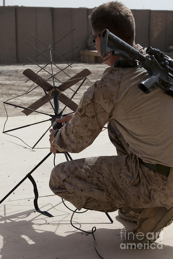 Communication Photograph - U.s. Marine Repositions A Satellite by Stocktrek Images