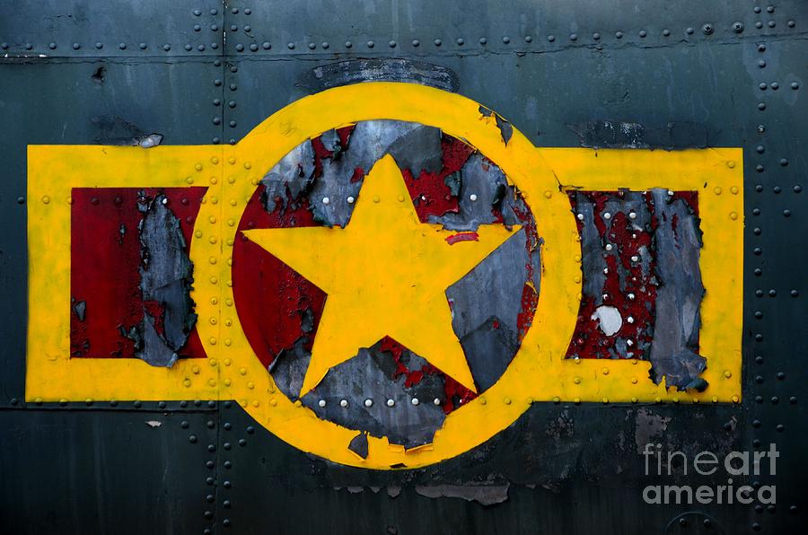 US military airplane fuselage with weathered stars and stripes logo Photograph by Imran Ahmed