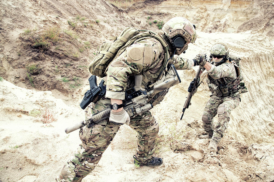 U.s. Soldier Helping A Fellow Soldier Photograph by Oleg Zabielin ...