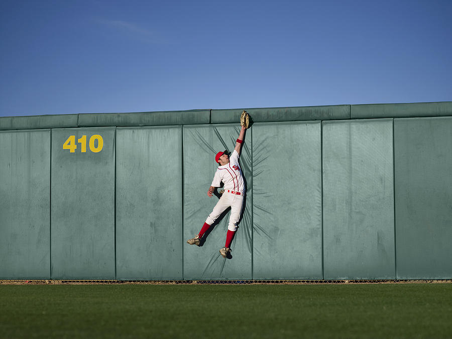 San Bernardino Photograph - USA, California, San Bernardino, baseball player making leaping catch at wall by Donald Miralle
