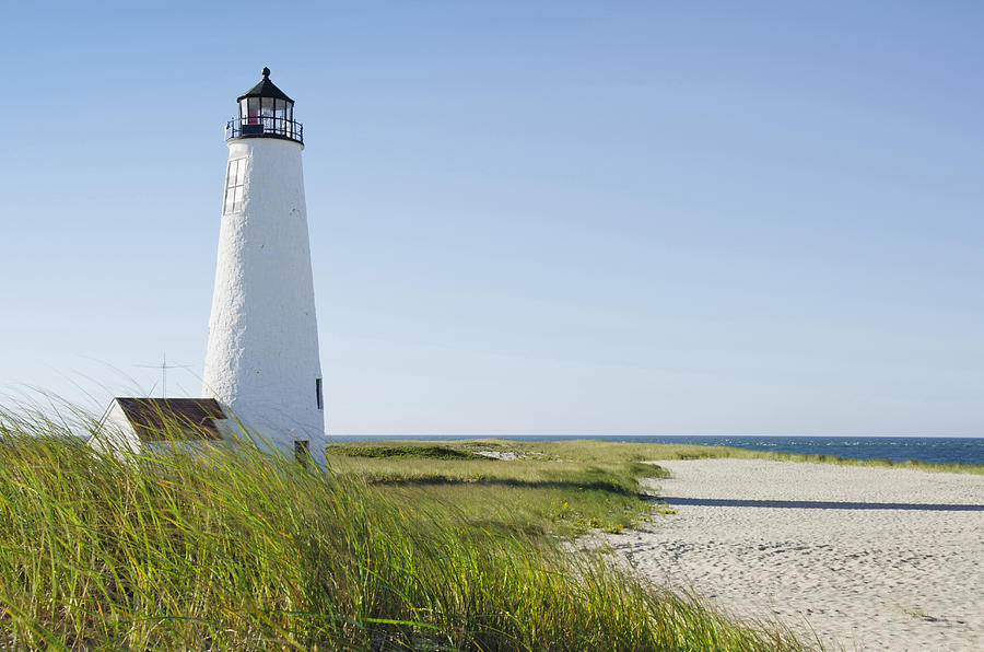 USA, Massachusetts, Nantucket, Great Point Lighthouse on overgrown beach against clear sky Photograph by Chris Hackett