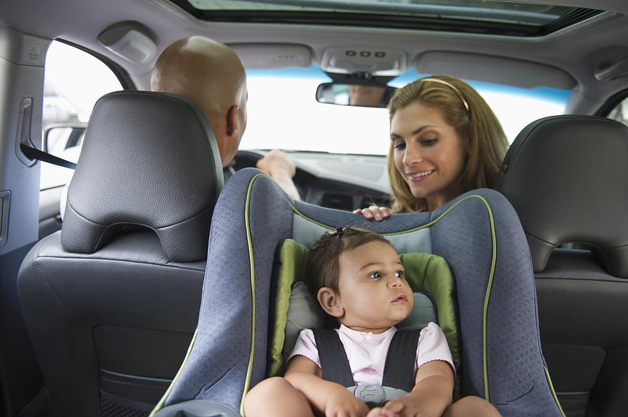 USA, New Jersey, Jersey City, Young family with small girl (12-18 months) sitting in car Photograph by Tetra Images