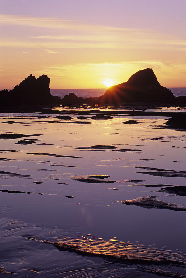 Usa, Sun Setting Over Rocks And Photograph by Greg Vaughn - Fine Art ...