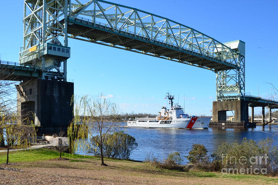 USCG Diligence Passing Under Photograph by Bob Sample