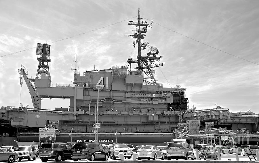 Uss MIDWAY MUSEUM CV 41 Aircraft carrier - from parking lot view - Black and White Photograph by Claudia Ellis