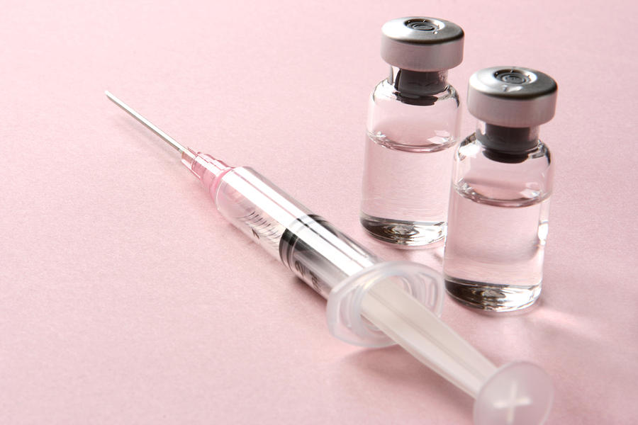 Vaccination: Syringe and Vials with Medicine Photograph by JurgaR