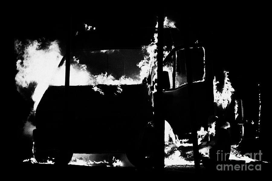 Northern Photograph - Van burning as roadblock during loyalist rioting and violence north belfast northern ireland by Joe Fox