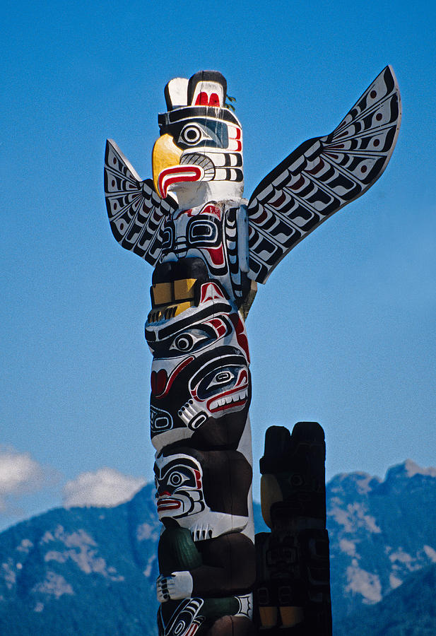 Vancouver totem Photograph by Dennis Cox