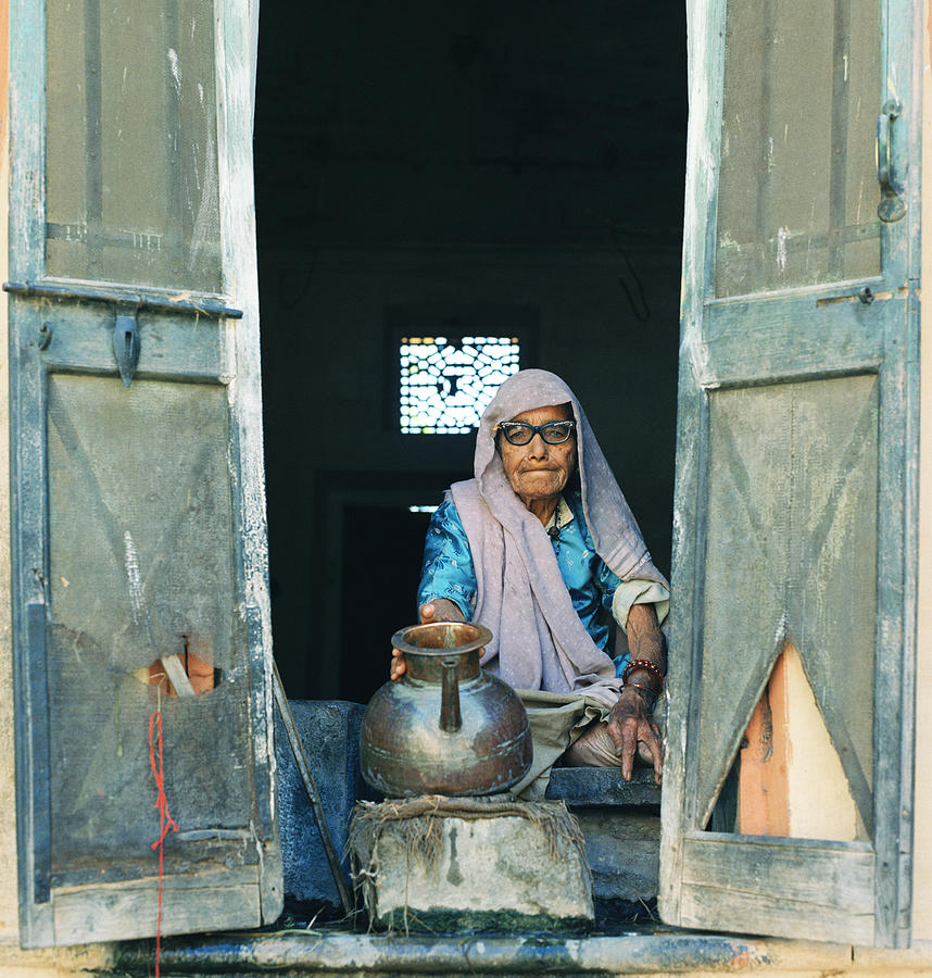Varanasi Water Seller Photograph by Shaun Higson
