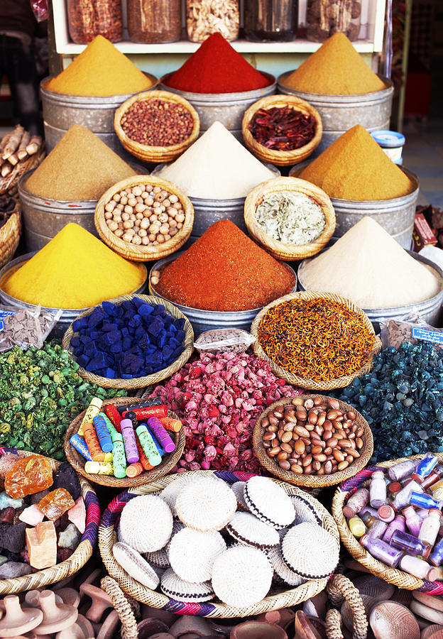 Various spices on display in the Souk Photograph by Gary Yeowell