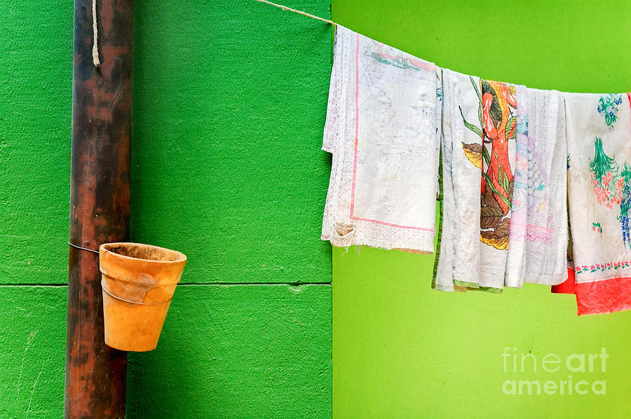 Vase towels and green wall Photograph by Silvia Ganora