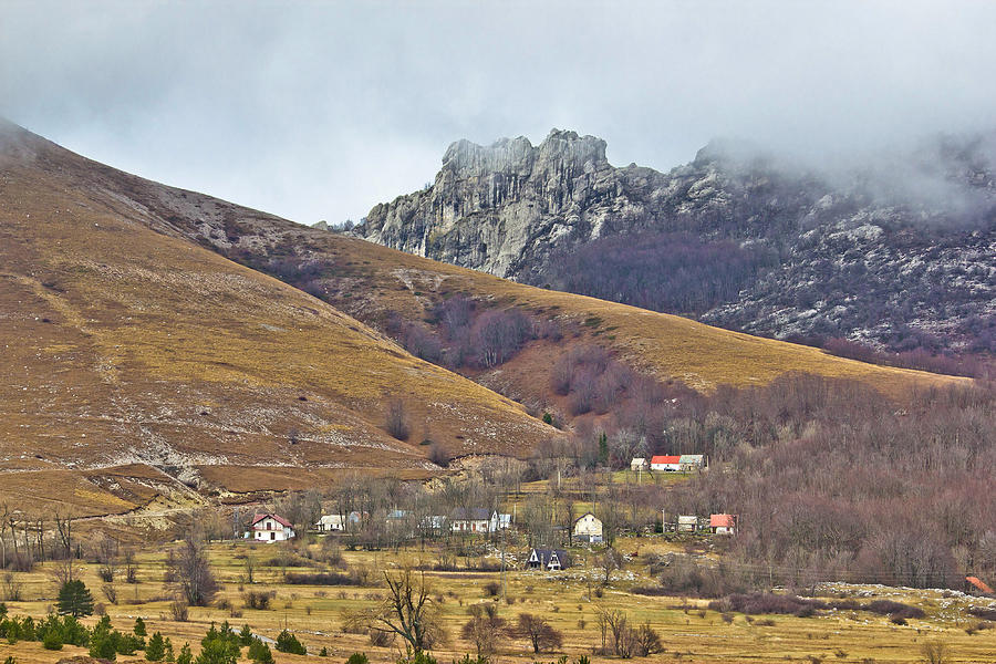 Velebit mountain village in fog Photograph by Brch Photography