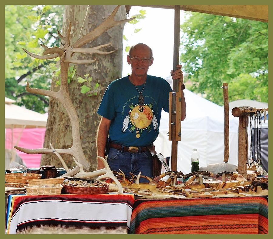 Vendor at the July 2014 Hannibal Craft Show Photograph by Kathryn Cornett