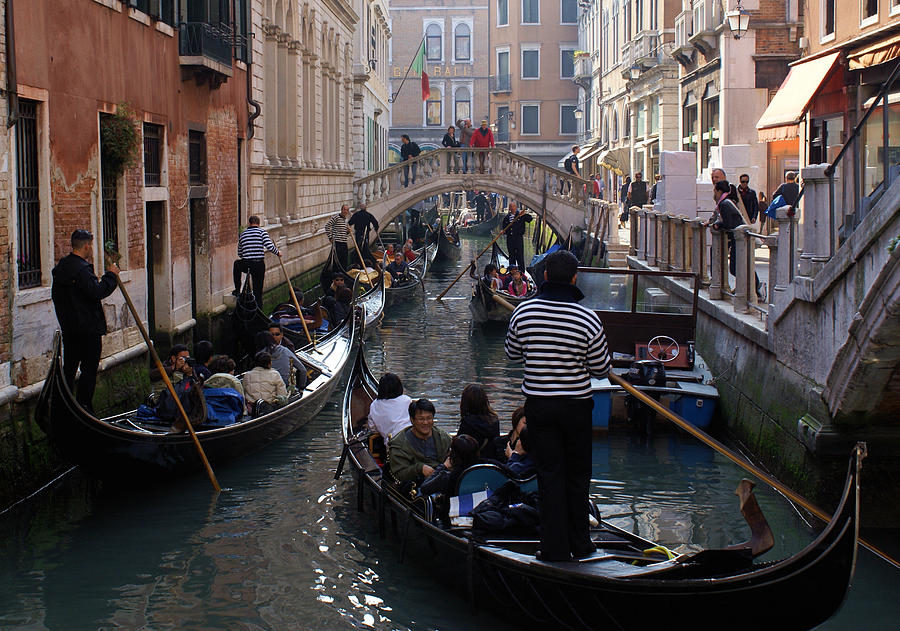 Venetian traffic jam Photograph by Ron Harpham