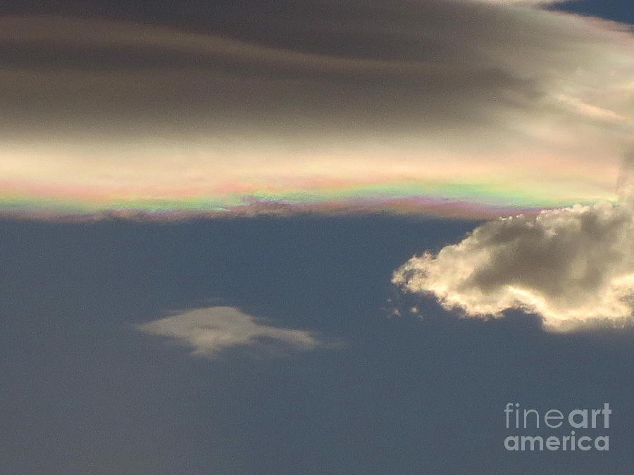 Very Rare Cloud with Rainbow inside it. Photograph by Robert Birkenes