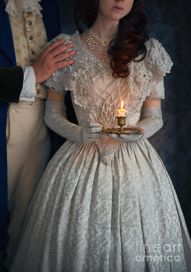 Victorian Couple At Night With Candle Photograph by Lee Avison